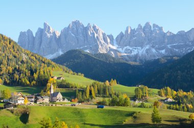 Village with Dolomites background clipart