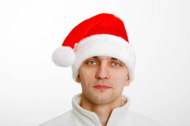 genç adam Noel Baba şapkası