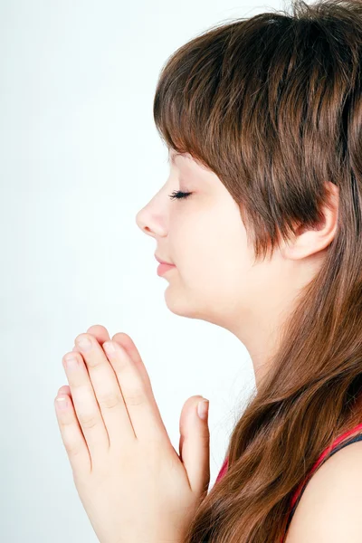 Chica alemana dobló sus manos en oración — Foto de Stock