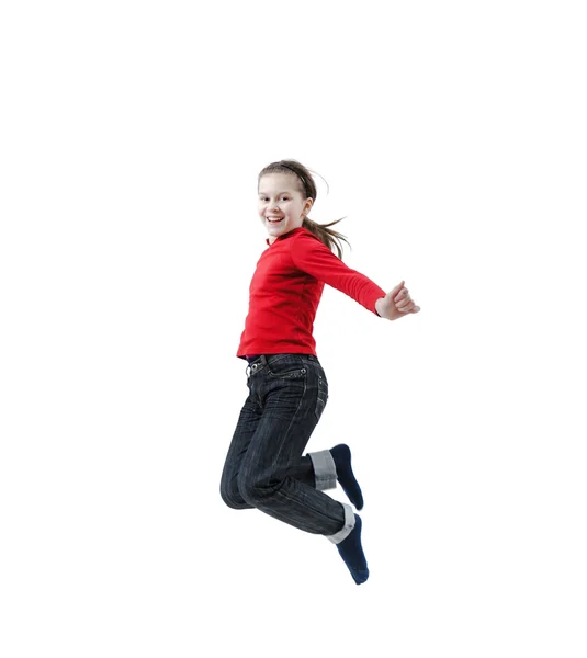 Счастливая девочка прыгает — стоковое фото