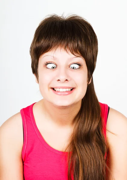 Cross eyed squinting expression girl — Stock Photo, Image