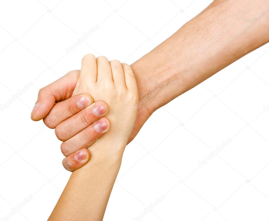 Man's hand holding a child's hand