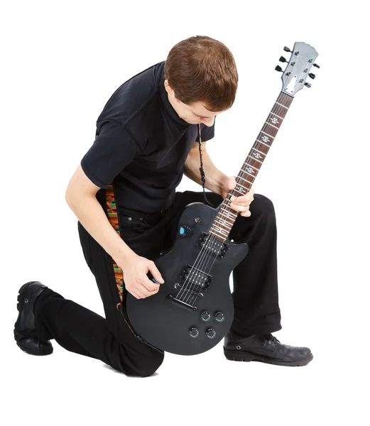 Man med en elektrisk gitarr — Stockfoto