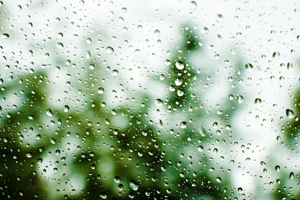 Gotas de chuva em vidro — Fotografia de Stock