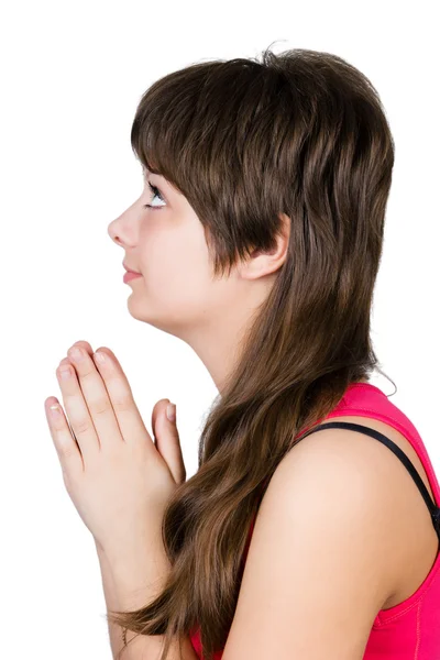 Jovem menina bonita orando. isolado — Fotografia de Stock