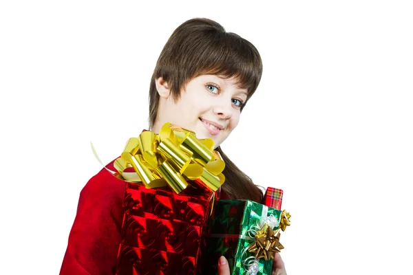 Beautiful young girl with a bunch of gift boxes on white — Stock Photo, Image