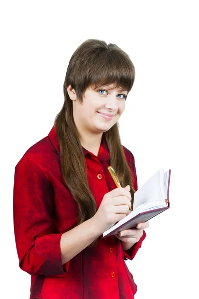 Hermosa joven con cuaderno y pluma en un blanco —  Fotos de Stock