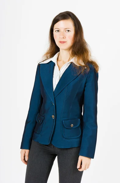 青ジャケット スタンディングで深刻な女性 — ストック写真