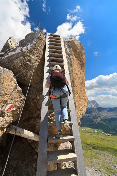 Hiker on wooden ladder — Stock Photo, Image