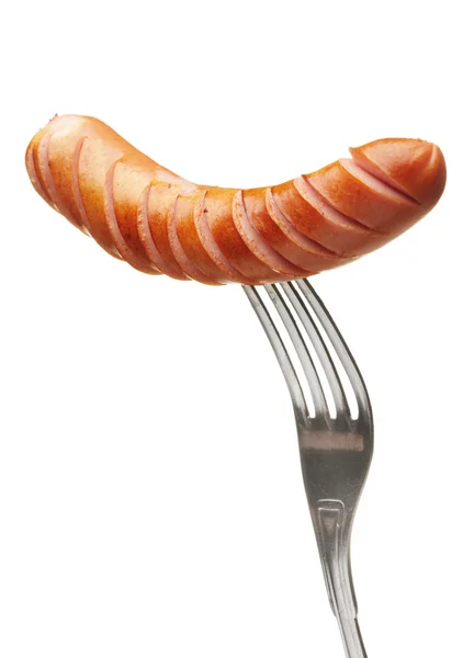 Grilled sausage on a fork — Stock Photo, Image