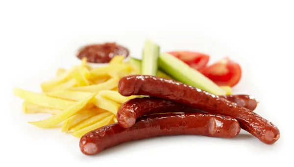 Grilled sausages and french fries — Stock Photo, Image