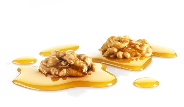 Walnuts and maple syrup — Stock Photo, Image