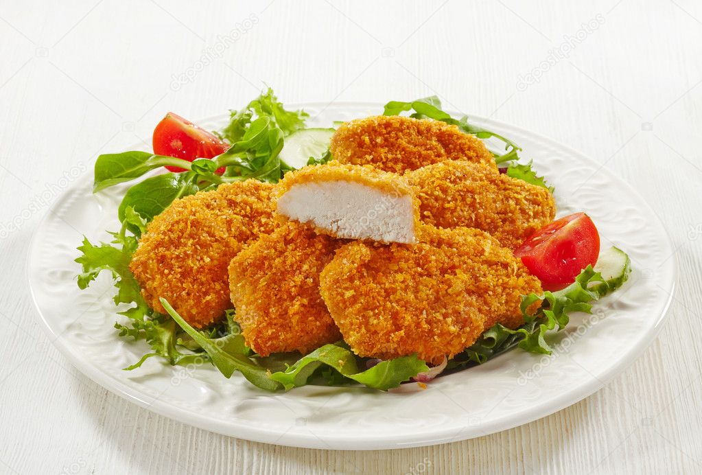 Chicken nuggets Stock Photo by ©zmaris 30512327