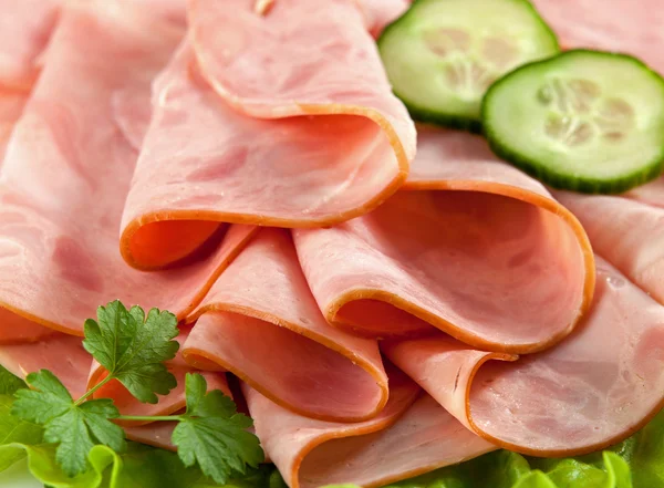 Sausage slices and vegetables — Stock Photo, Image