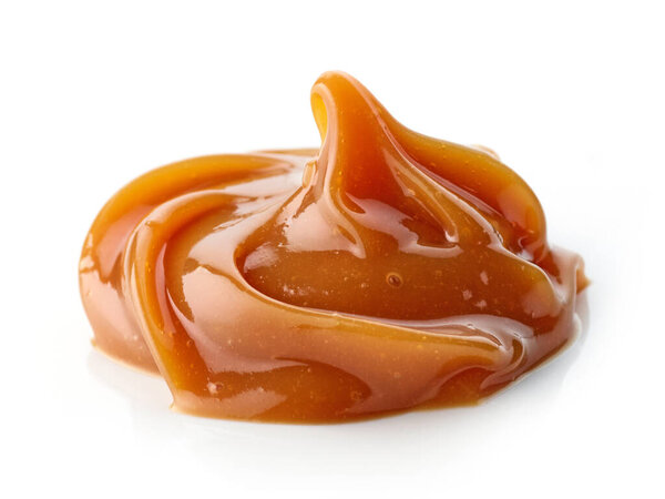 melted caramel isolated on white background