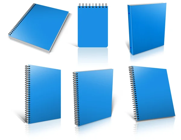 Sechs blaue Spiralblöcke auf weißem Papier. — Stockfoto