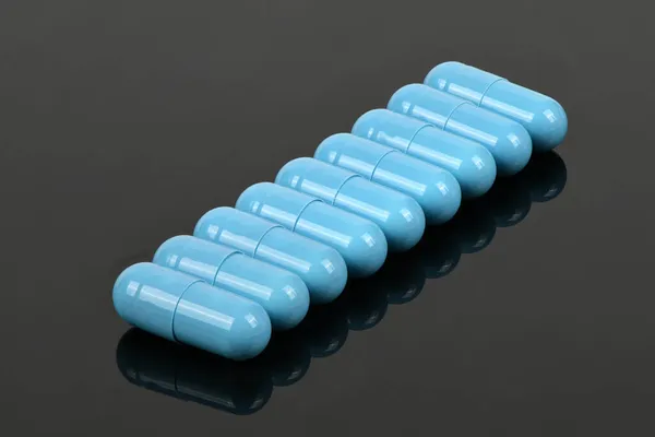 Blue Medical Capsules Pill Acrylic Black Background High Resolution Photo — Stock Photo, Image