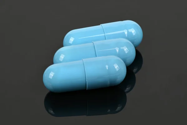 Blue Medical Capsules Pill Acrylic Black Background High Resolution Photo — Stock Photo, Image