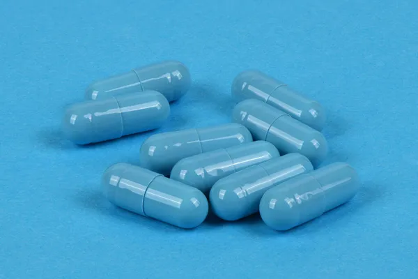 Pastillas Médicas Azules Sobre Fondo Azul Foto Alta Resolución Profundidad —  Fotos de Stock