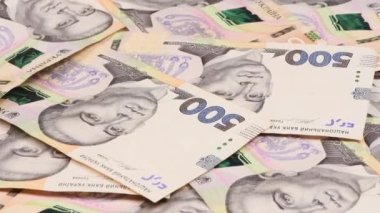 UAH (Ukrayna Hryvnia) Ukrayna 'nın ulusal para birimi. Yan görüş. Döngü hareketi. Rotasyon 360. 4K UHD video görüntüsü 3840X2160.
