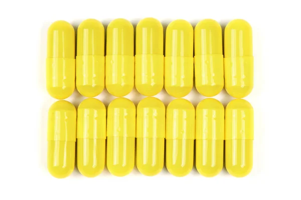 Фармацевтические Таблетки Лекарства Здоровья Людей Лечить Болезни Желтые Таблетки Белом — стоковое фото