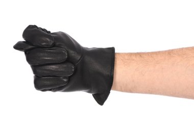 Beyaz arka planda siyah deri eldiven giyen adam, yakın plan. Yan görüş. Yüksek çözünürlüklü. Tam alan derinliği.