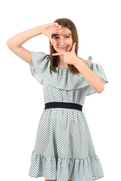 Young Beautiful Girl Blue Dress Polka Dots White Background Smiling — Stock Photo, Image