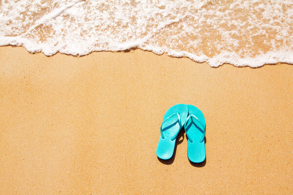 Flip flops on the sand