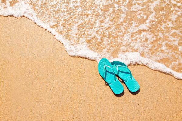 Flip flops on the sand