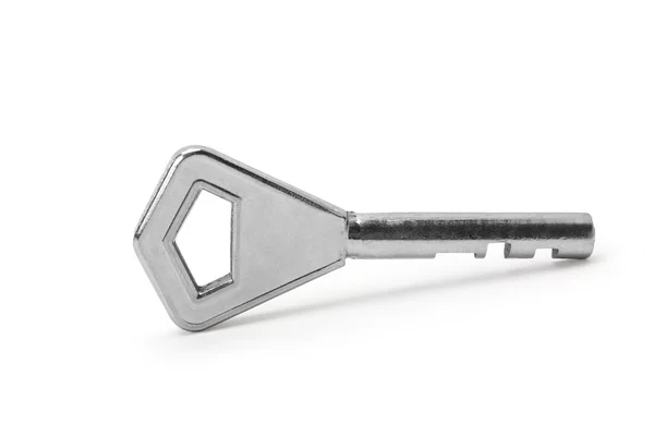 Key on a white background — Stock Photo, Image