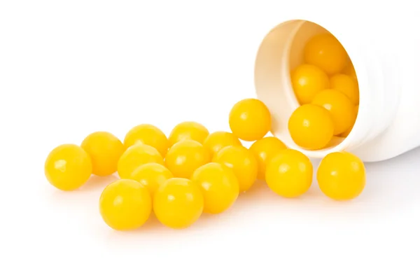 Желтая таблетка — стоковое фото