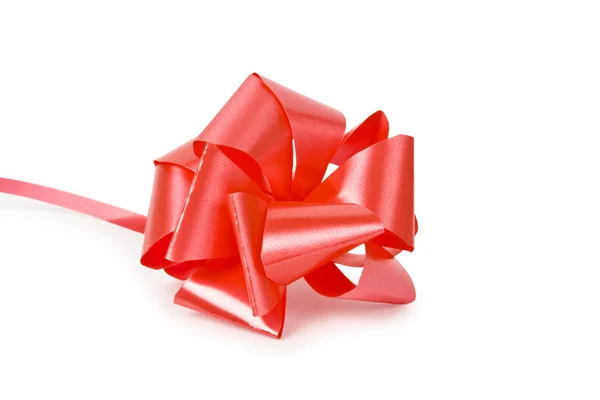 Red ribbon with bow on white — Stock Photo, Image