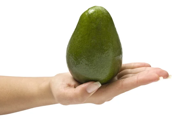 Avocado in a hand — Stock Photo, Image