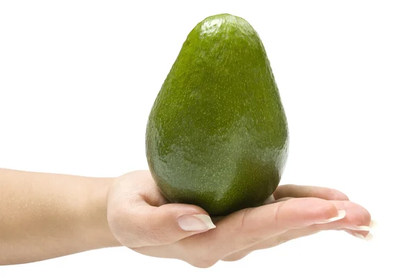 Avocado in a hand — Stock Photo, Image