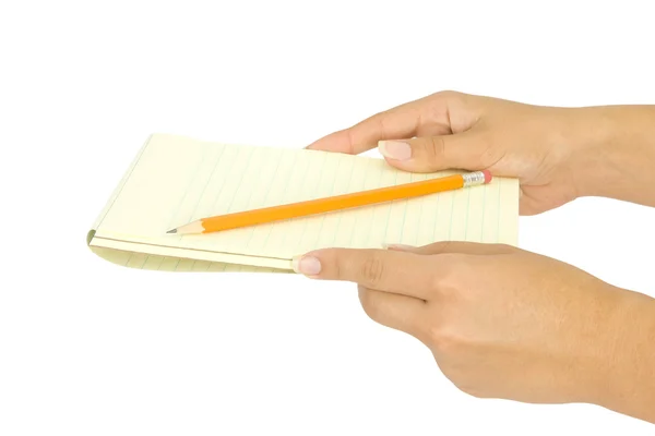 Notebook in hand Stock Image