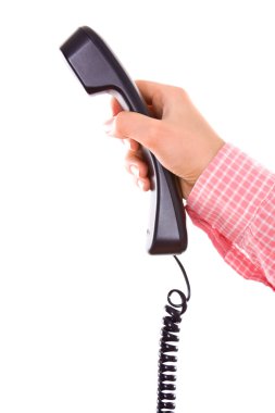 Telefon elinde.