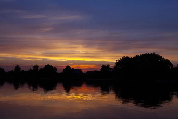 Річка захід сонця — стокове фото