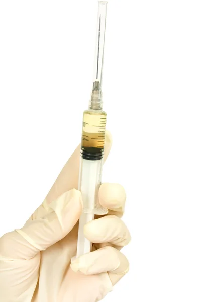 Injekční stříkačka v ruce — Stock fotografie