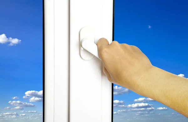 Hand opens window — Stock Photo, Image