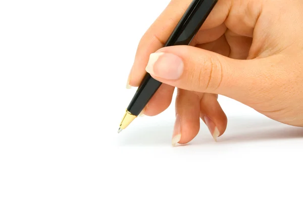 Penna i en hand Stockbild