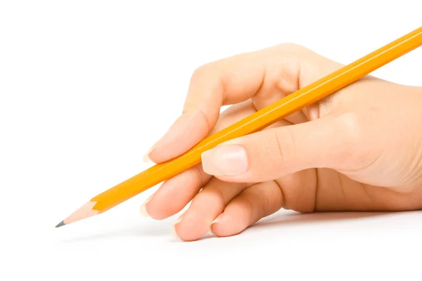 Pencil in a hand Royalty Free Stock Photos