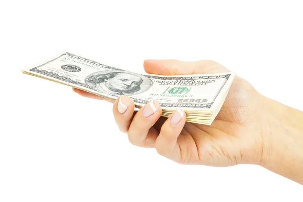 Многие доллары падают на руку женщине с деньгами — стоковое фото