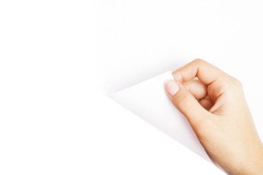 bir insan eli kağıt beyaz sayfa açmak