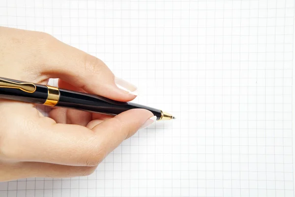 Pen in de hand geïsoleerd op witte achtergrond — Stockfoto
