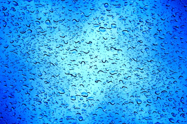 Gotas de agua en la superficie metálica. Fondo abstracto —  Fotos de Stock