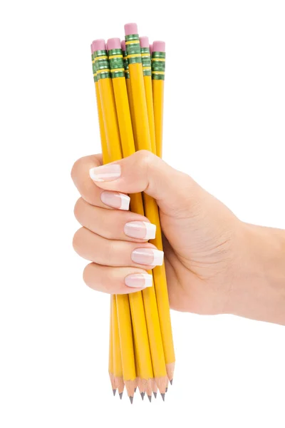 Potloden in een hand is geïsoleerd op een witte achtergrond — Stockfoto