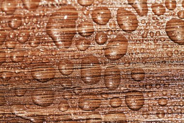 Water drops on a wooden surface clipart