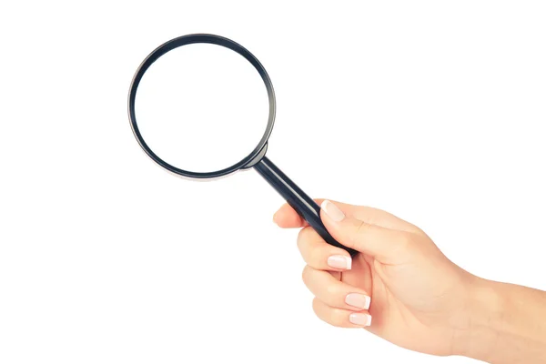 Hand holding magnifying glass — Stock Photo, Image