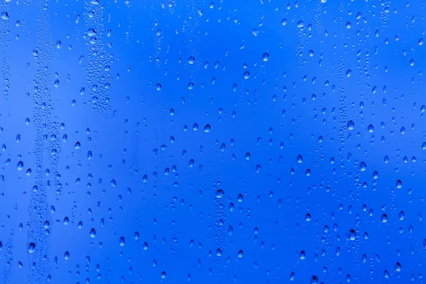 Gotas de agua sobre vidrio — Foto de Stock