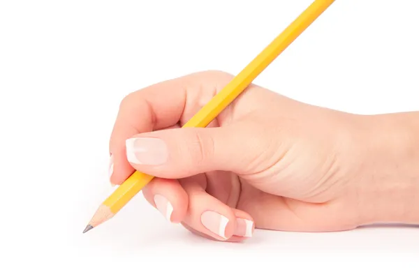 Pencil in a hand Royalty Free Stock Photos